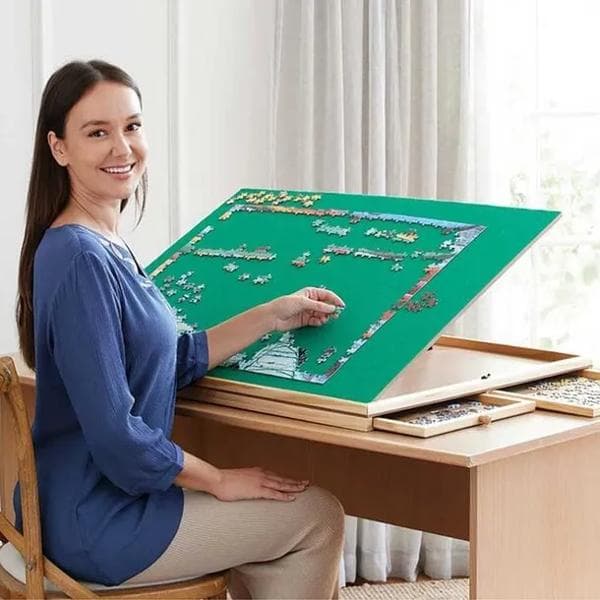 Easylife product image - Woman using a tilted wooden puzzle board with a green felt surface and sorting drawers.